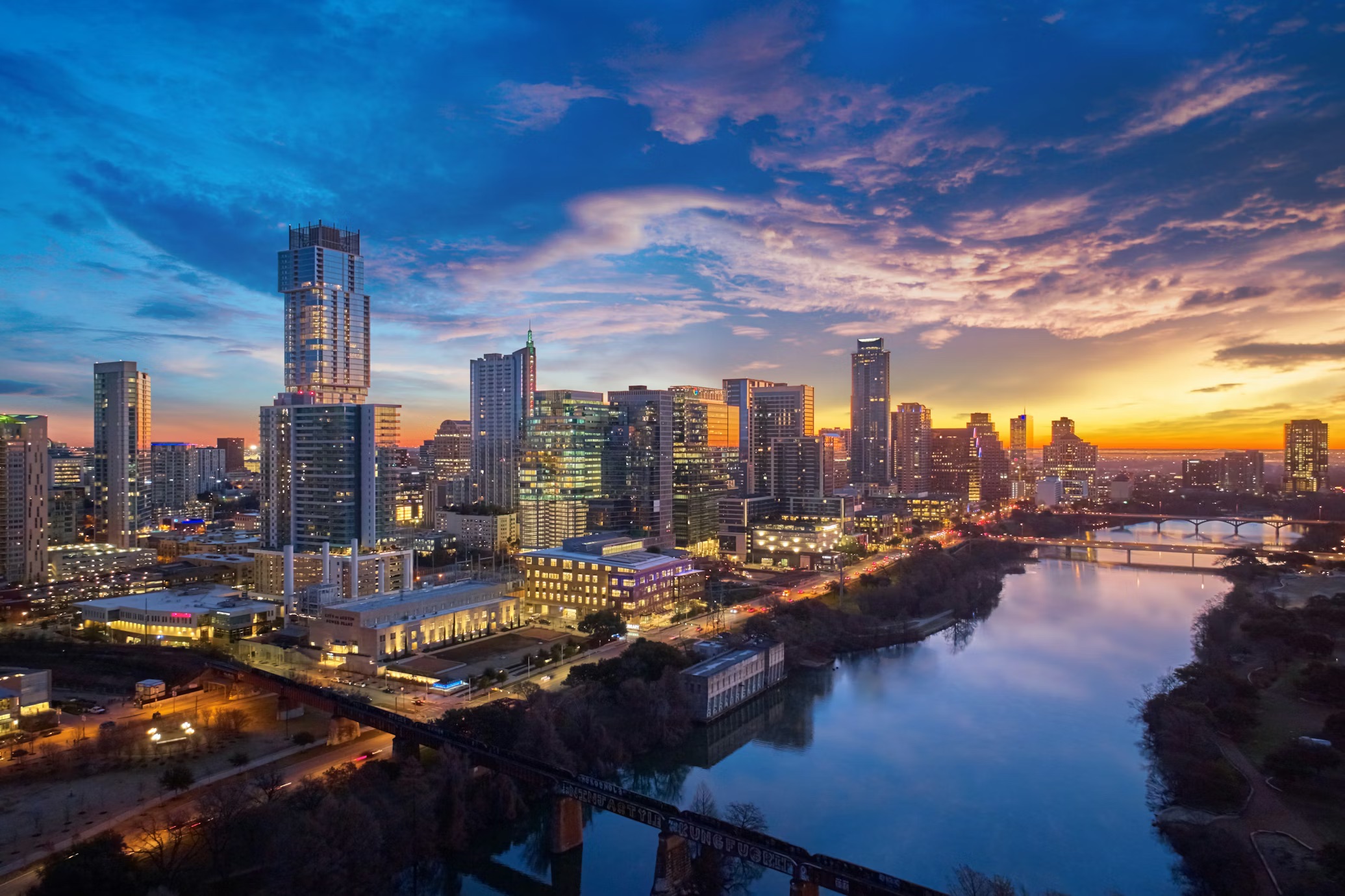 Austin, Texas skyline over Lady Bird Lake at sunset